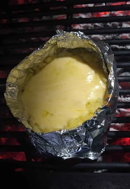 PAPA ASADA CON QUESO