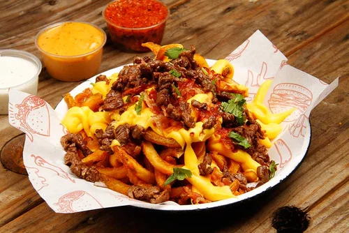 Papas Arrachera y Tocino